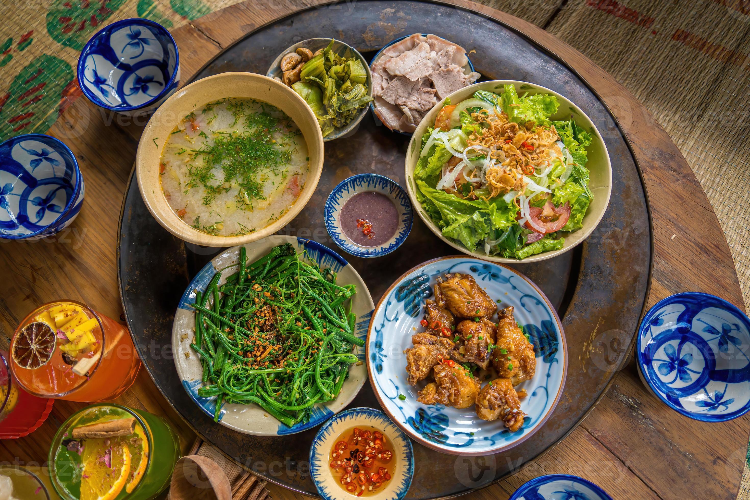 Vietnamese home-style spread with rice, greens, and chicken