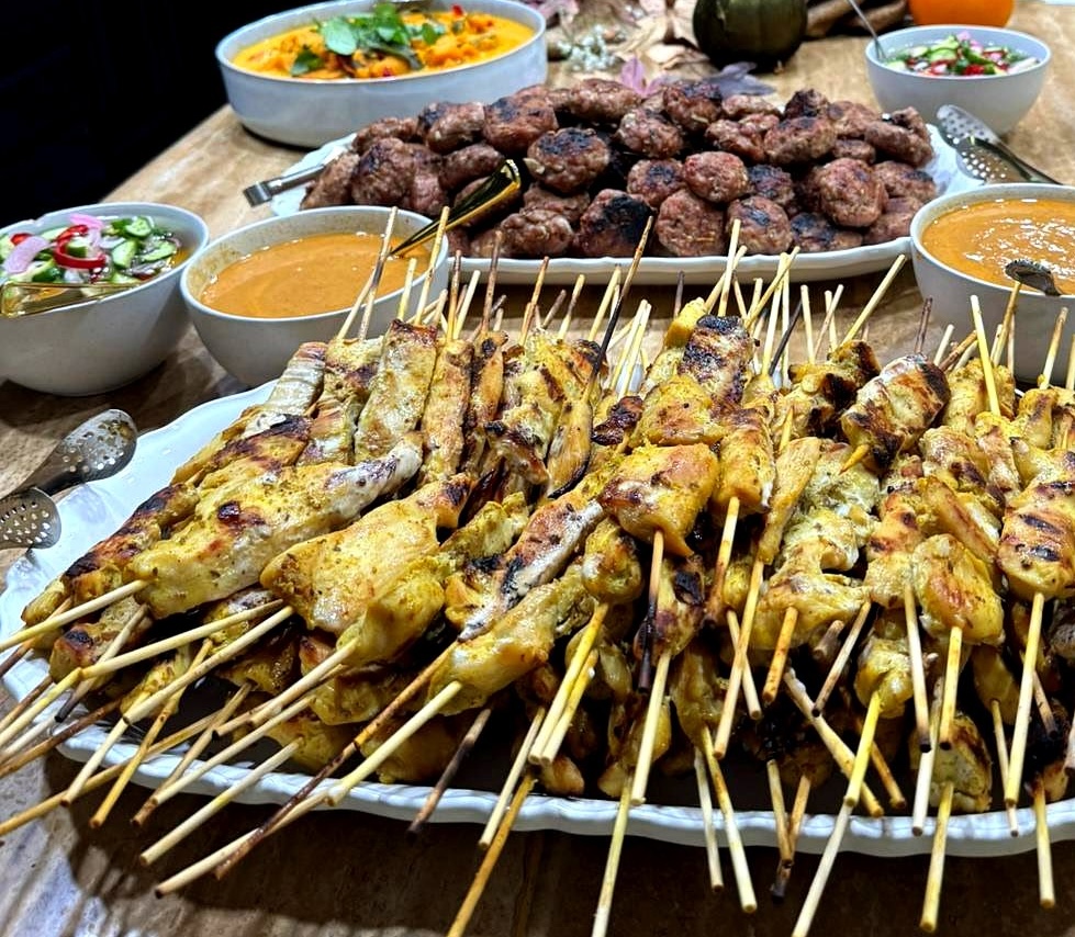 Rice & Shine satay spread with chicken skewers, meatballs and sauces